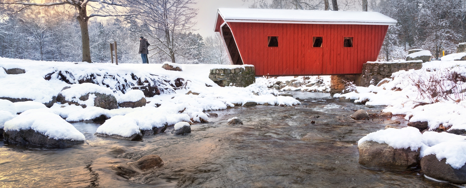 Covered bridge at Kent Falls State Park in Winter