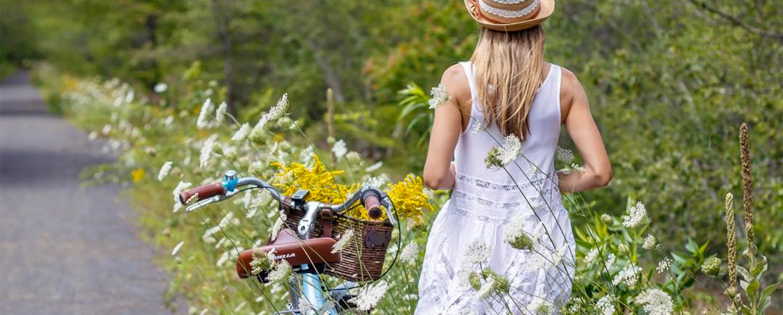 Woman on beach cruiser along Air Line State Park Trail (Instagram@fotolga_)