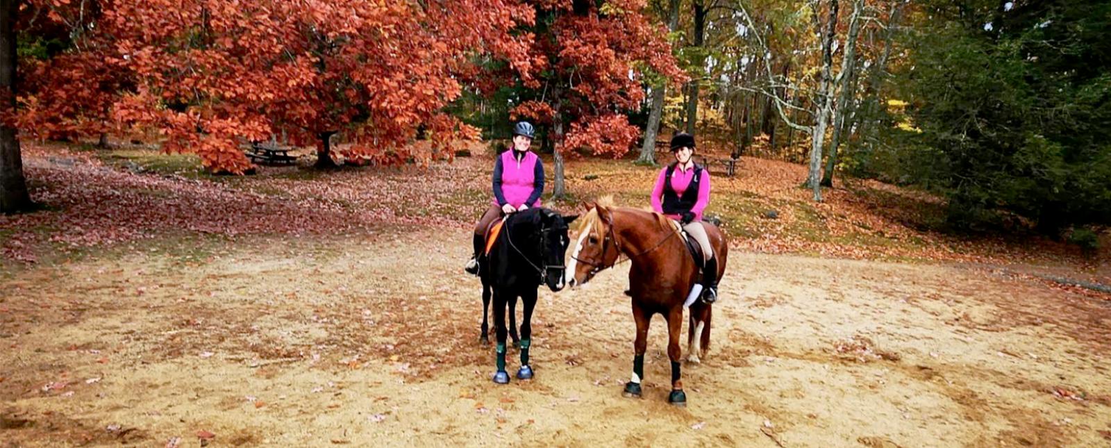 Two women horseback riding in the fall (Instagram@daniellaa81)