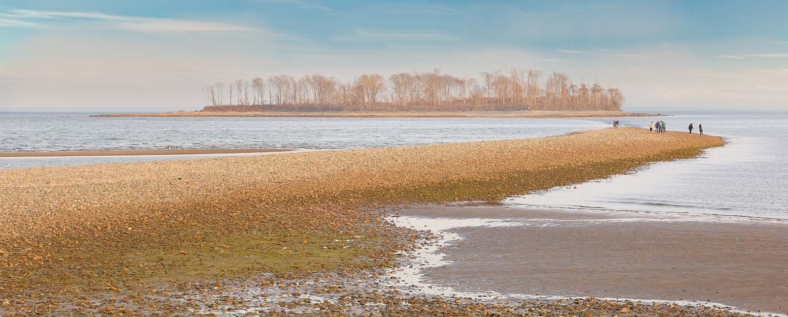 Walking along shoreline at Silver Sands State Park