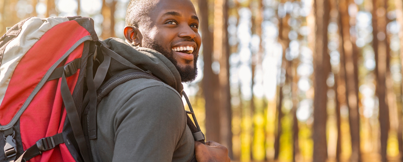 Man hiking through the woods