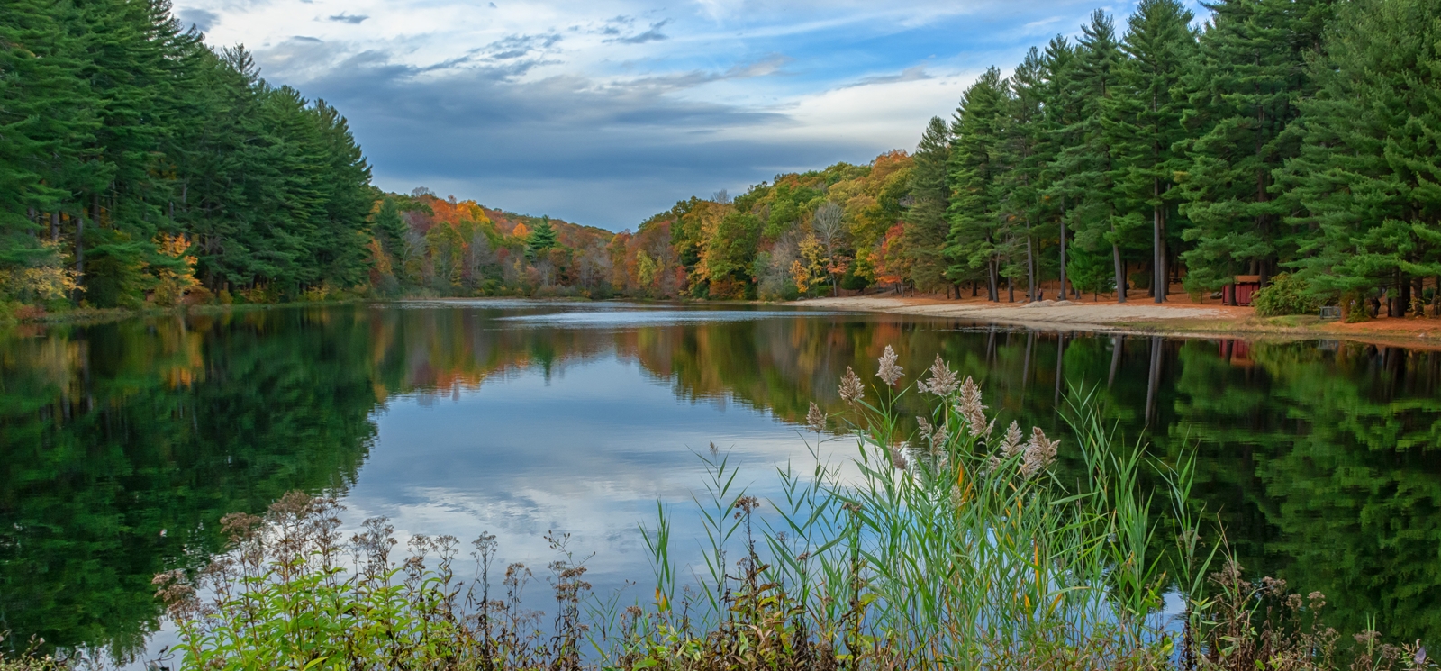 Vista shot of Chatfield Hollow water and tree line (Flickr)