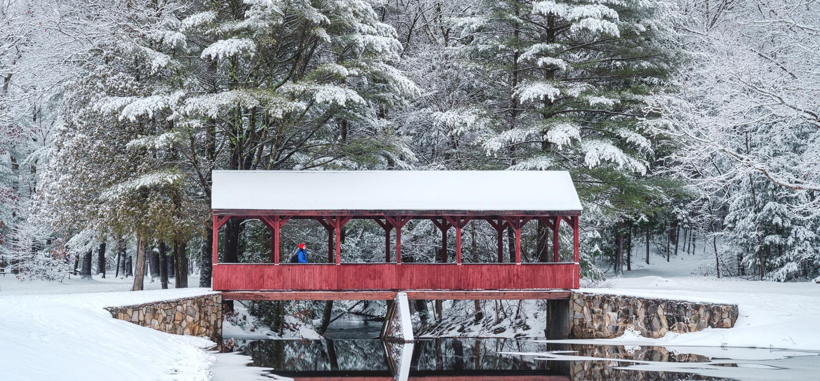 Outdoor activities on snow covered frozen lake and red ice fishing