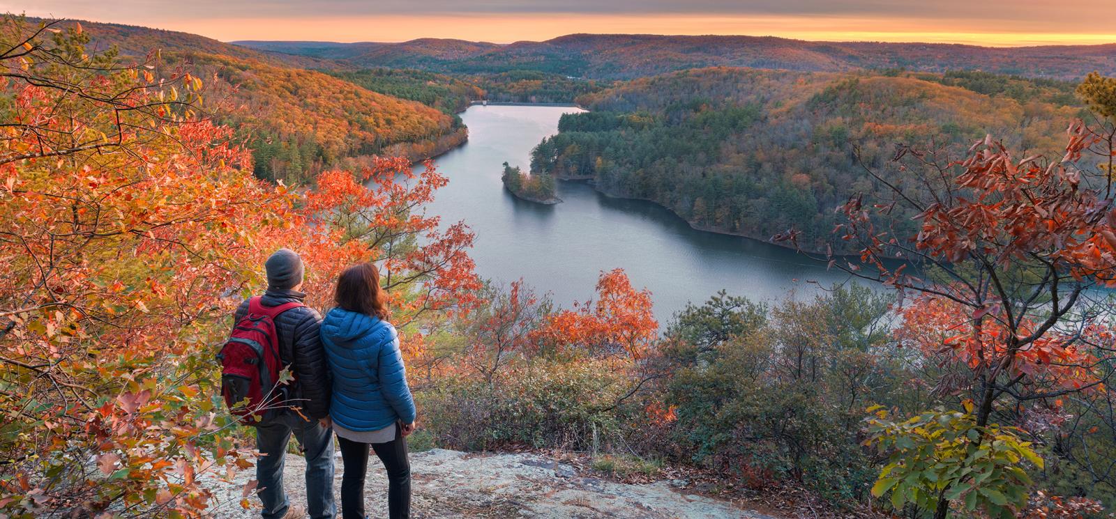 Couple overlooking vista scenery at Peoples State Forest