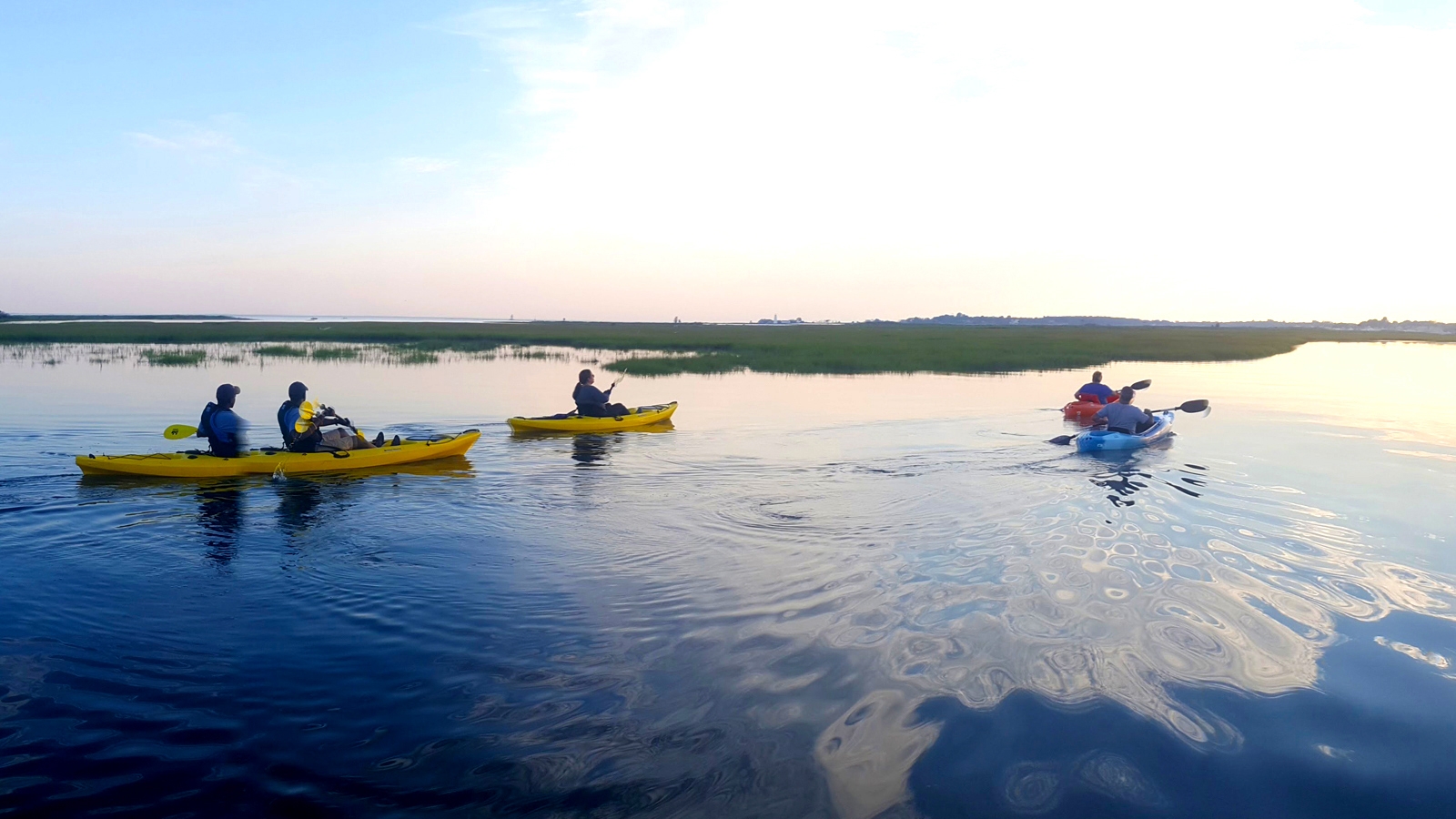 Group kayaking trip along the Connecticut shoreline