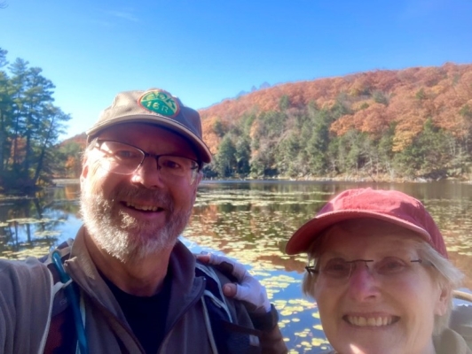 couple standing in front of the water at bigelow hollow