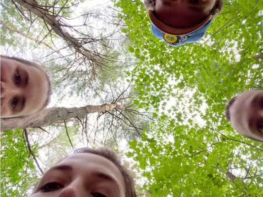 selfie of a group of friends looking at the camera 