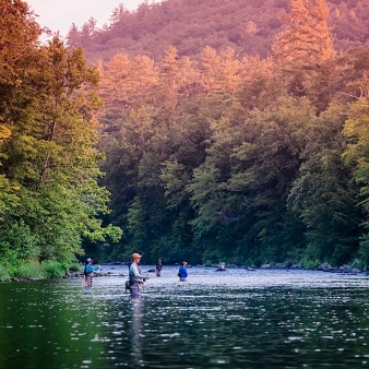 Group fly fishing at dusk at American Legion (Instagram@nyctrout)