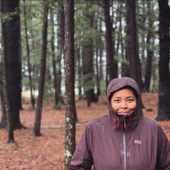 Woman posing in Black Rock State Park during rain (Instagram@nadiafenay)