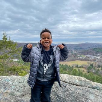 Boy at the peak of Black Rock hiking trail (Instagram@kennected)