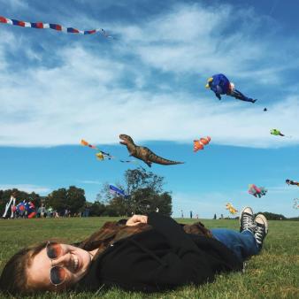 Kites flying overhead of young women (Instagram@danielle.lelee)