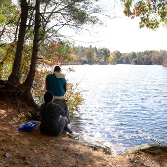 Couple fishing in Hopeville Pond in Fall