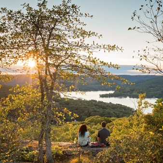 Couple enjoying scenic view of Lake Waramaug