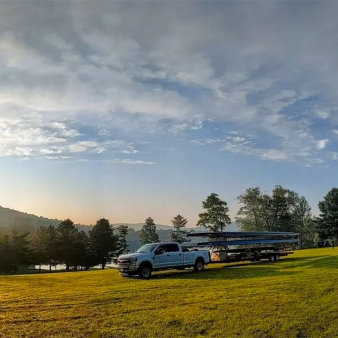 East Lyme Rowing Team Truck Towing Boats (Instagram@eastlymerowing)