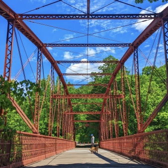 Man on Lovers Leap bridge with dog (Instagram@badw0lf)