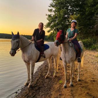 Two women horseback riding (Instagram@horseys)