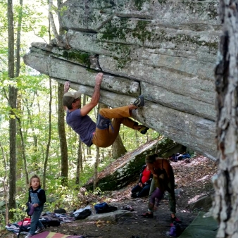 Man climbing rock face in Mashamoquet State Park (Instagram@dannish.boy_)