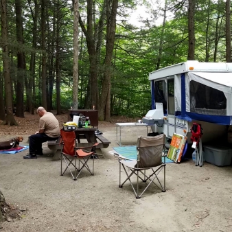 A man camping with his dog (Instagram@lafromboise5)