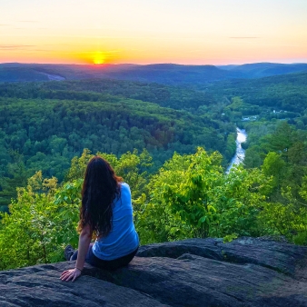 Woman at hiking vista in Peoples State Forest