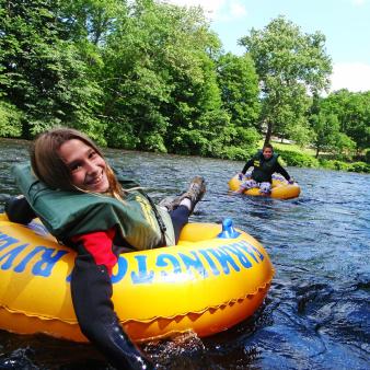 Kids tubing in the river (CTvisit)