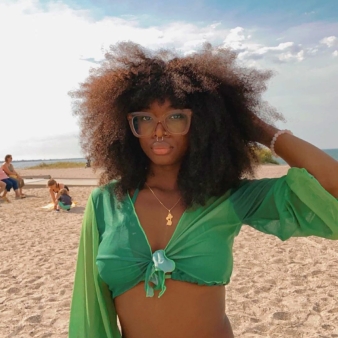 Silver Sands beach scene of woman at Silver Sands State Park (Instagram@_.boundless._)