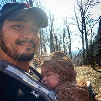 Father and son hiking up Sleeping Giant State Park (Instagram@harrah_goonie)