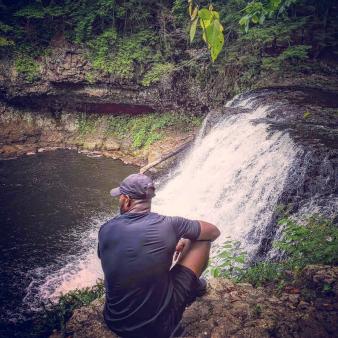Man overlooking Wadsworth Falls (Instagram@btl_85)