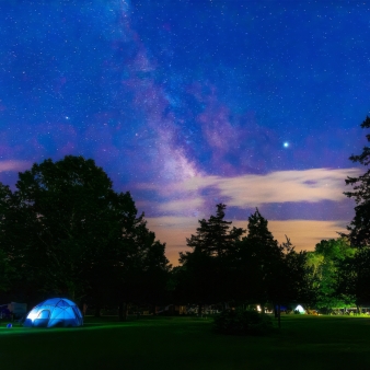 Nighttime camping scene at Rocky Neck State Park (Instagram@jonelucf)