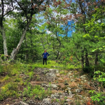 Woman hiking in summer at Nipmuck State Forest (Instagram@childinadrainpipe)