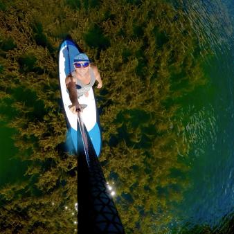 Man taking selfie on paddleboard in Squantz Pond (Instagram@soulpaddlene)