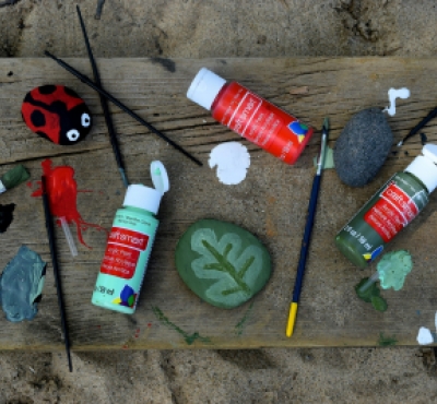 painted rocks and art supplies